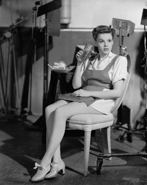 Judy Garland once belted out Over The Rainbow in her underwear from her hotel balcony to a group of hooting dockers, a book claims. Ex-assistant Stevie ­Phillips says she was paid extra to travel ...